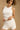 biały ściagaczowy top damski basic na ramiączkach "Ecru"